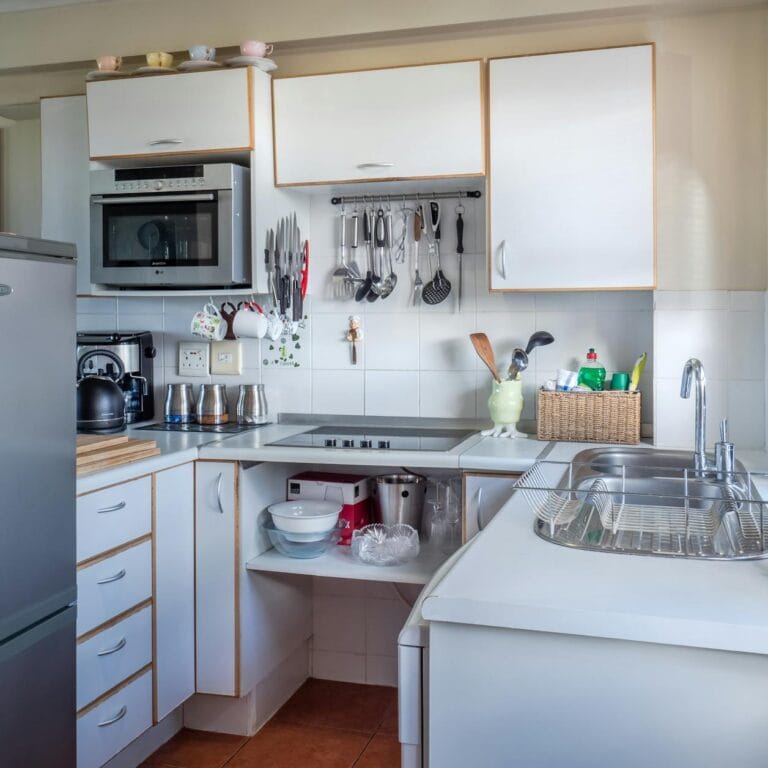 Sophisticated kitchen interior with modern appliances, wooden accents, and functional design.